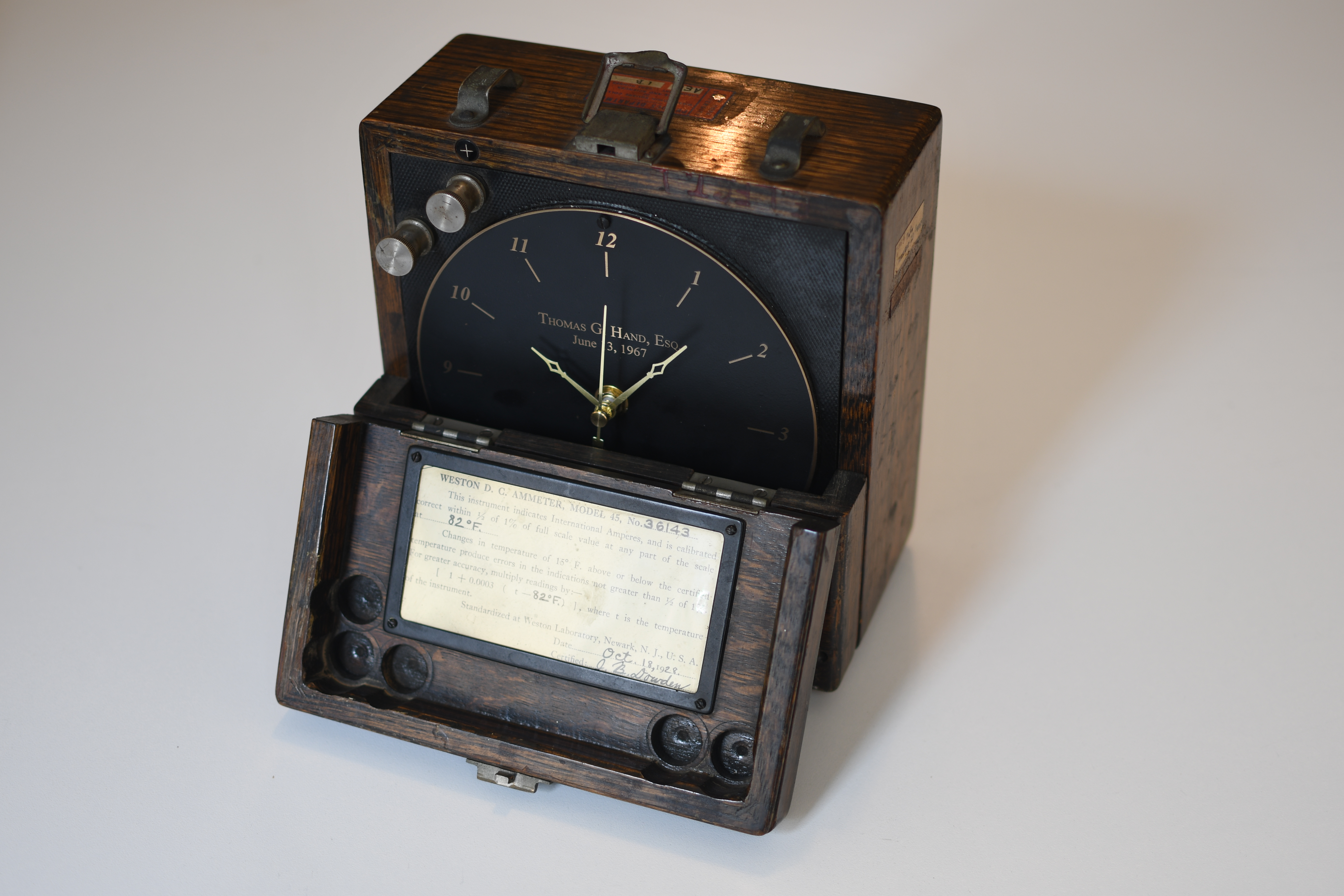 a photo of a clock in a wooden case